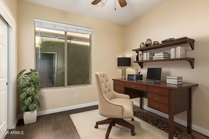 The third bedroom offers comfortable space and natural light, making it perfect for guests, family, or a private home office.