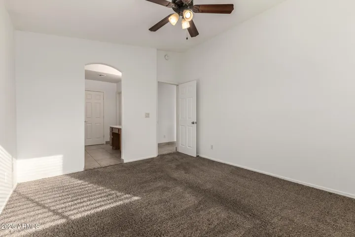 Primary Bedroom with vaulted ceiling
