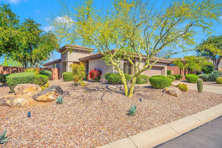 Spacious, professionally landscaped front entrance to home!
