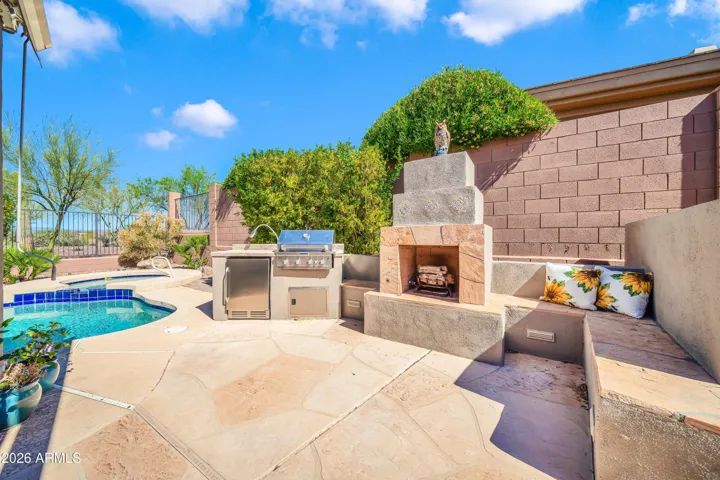 Built-in BBQ, refrigerator, and gas Fireplace- perfect for entraining
