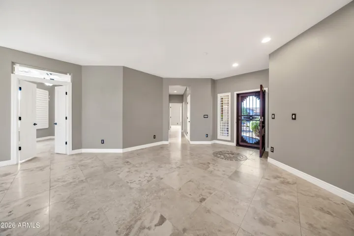 Main living looking at entry to private Den/office