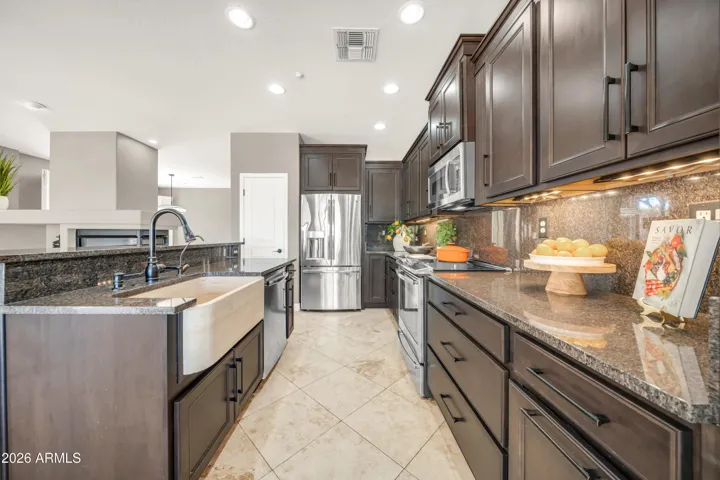 SS appliances, stone farm style sink and Thomasville Cabinets!