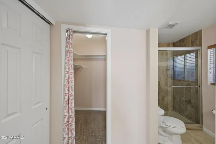 Primary Bathroom with two closets