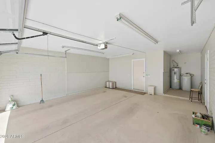 Very clean two car garage with small work/storage area
