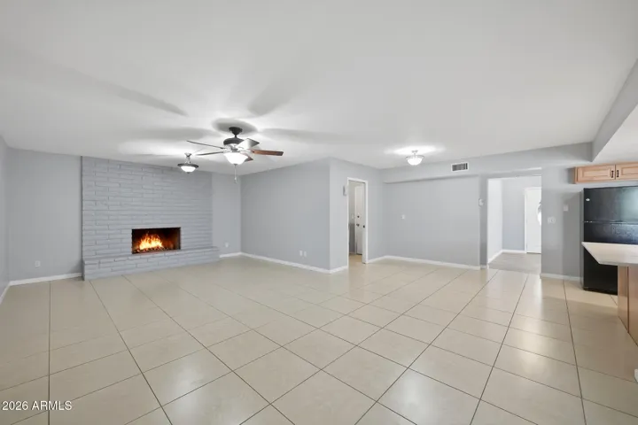 View from french doors towards fireplace, laundry room and front room entry