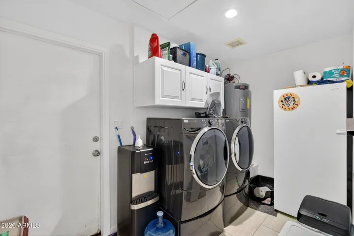 Large laundry with room for an extra freezer