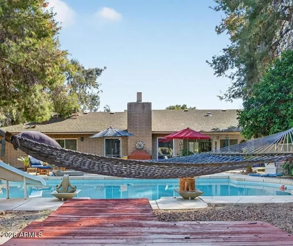 Nestled between two mature palms, there's no better place to relax after a hard day or week at work...