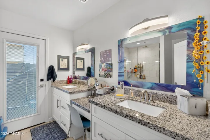 Dual sinks, granite , and direct entry from pool area