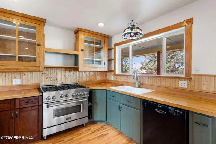 Upscale Gas Range, Farm Sink.