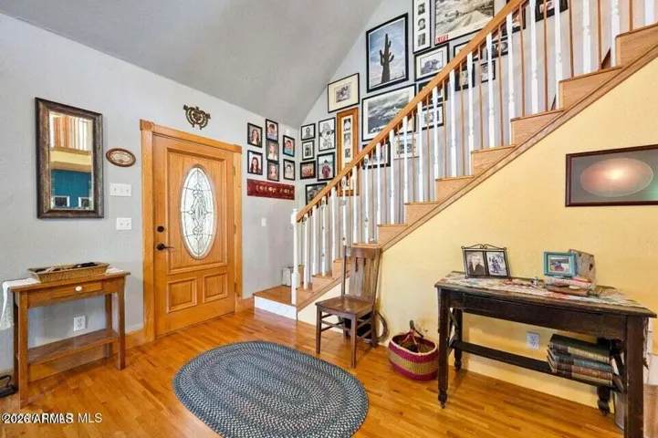 Foyer Entry to Living Room, with furnishings.