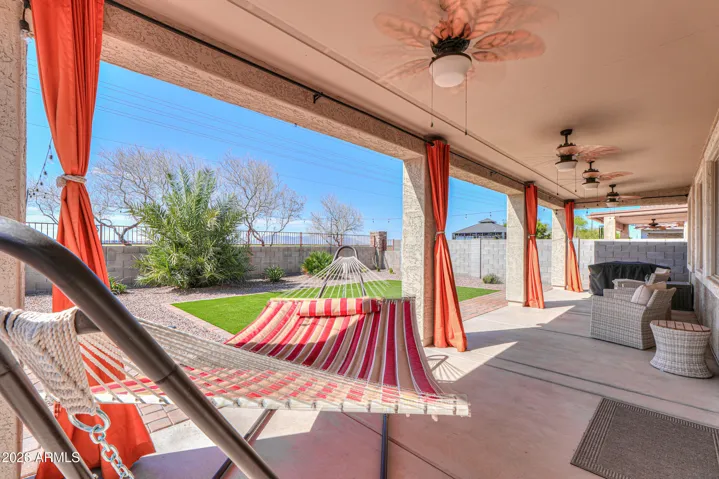 Full length covered patio with 4 ceiling fans!