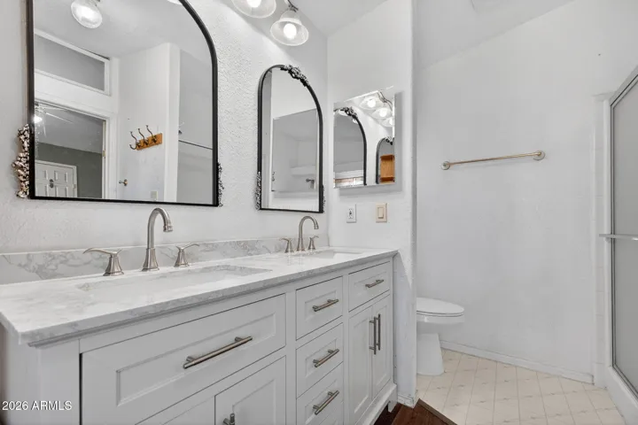 Updated mirrors and double sink vanity.