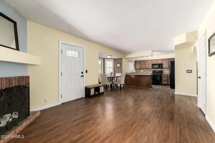 living room off kitchen, backyard door