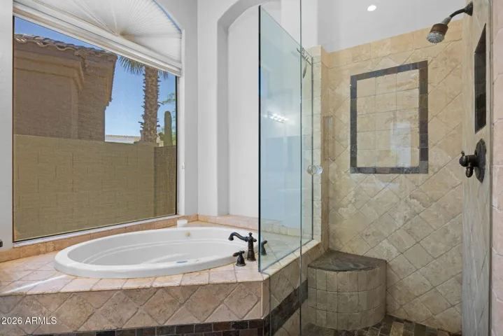 Primary Suite Walk-in Shower & Soaking Tub!