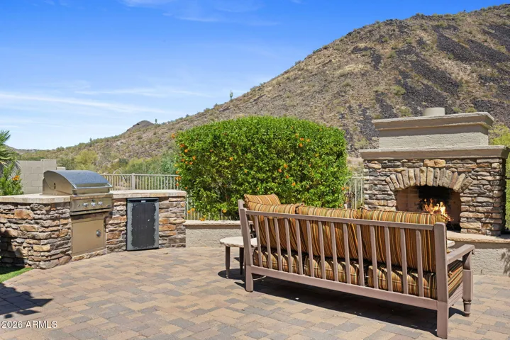 Exterior Fireplace & Built-in BBQ Island!