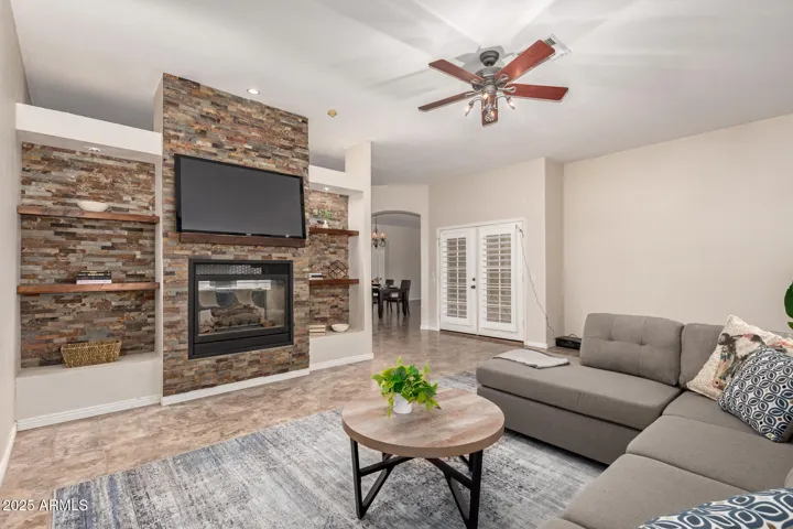 family room with 2 way fireplace - room for huge tv on other wall