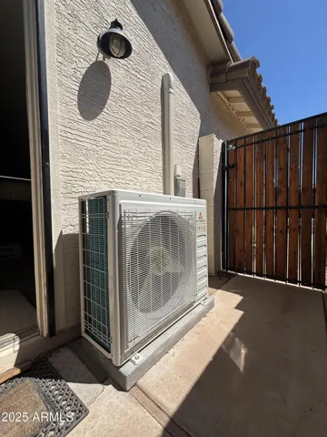 side yard with mini split for garage