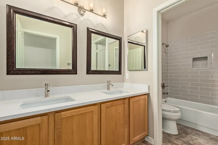 guest bath with updated tile and countertops