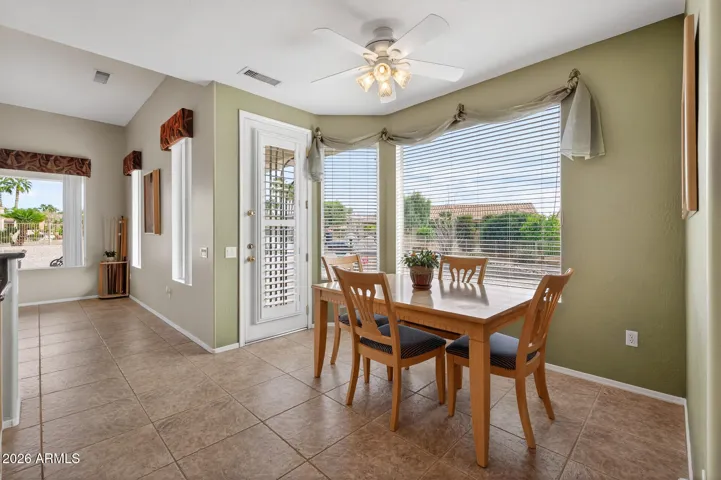 This casual space off the kitchen is the perfect place for a game area, sipping your favorite beverage or enjoying a relaxed meal.