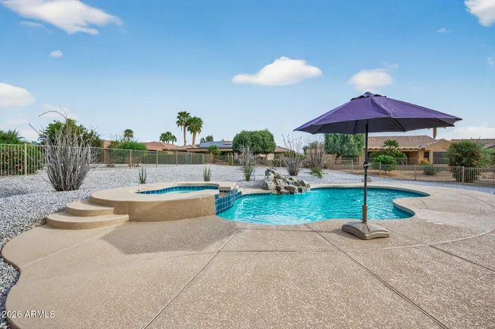 Notice all the patio space around the pool for lounging.