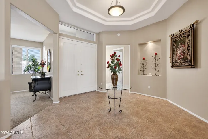 Entry the home through the double doors and be wowed by the impressive rotunda area.