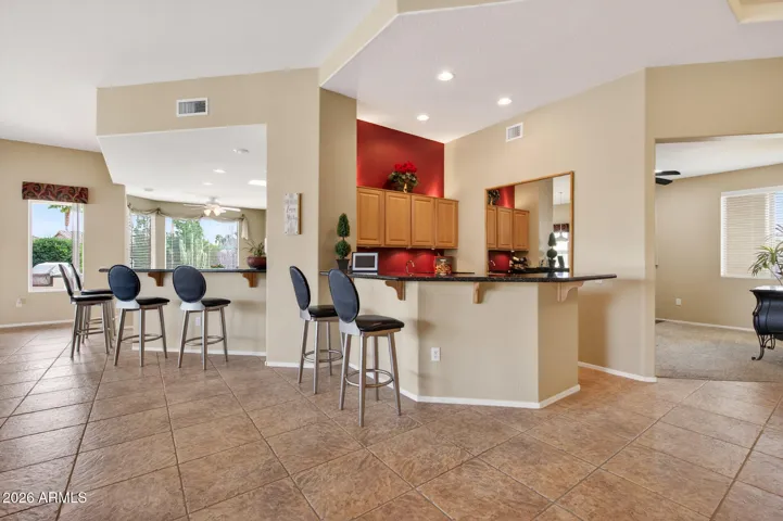 This is the view from the Great Room toward the bar and kitchen.