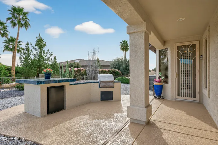 This BBQ kitchen is right off the kitchen through the breakfast nook.