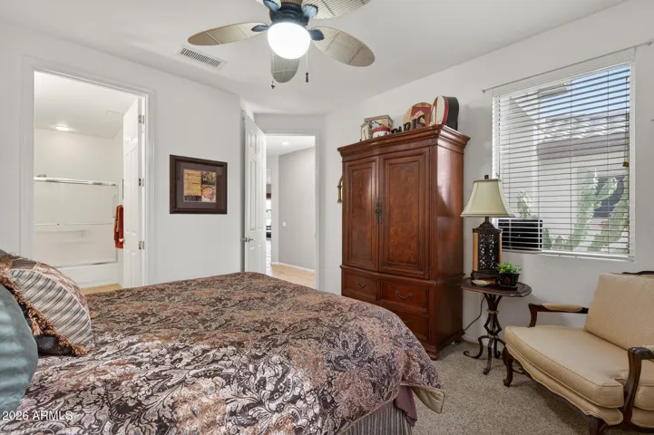 The 2nd bedroom offers views of the front of the home and a private full bath.