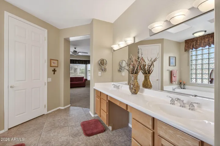 Double sinks mean no fighting for space in the owner's bath.