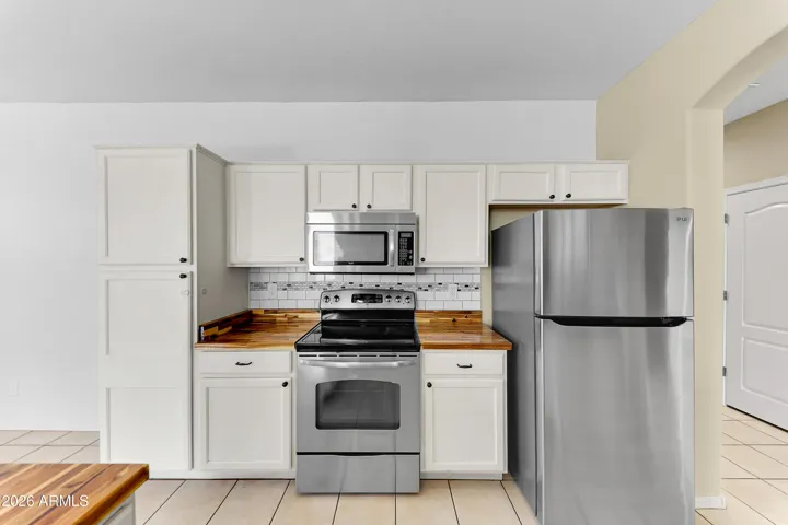 Stainless Steel w more cabinets and Pantry