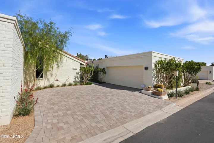 The upgrades start as soon as you pull in: paver driveway