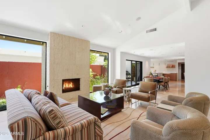 Woodburning limestone-clad fireplace