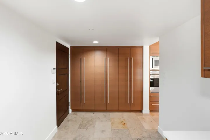 Storage between garage entrance and kitchen