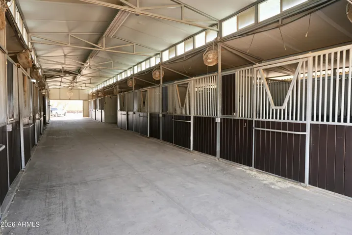 main barn with 21 show stalls, 4 wash racks and 2 tack rooms