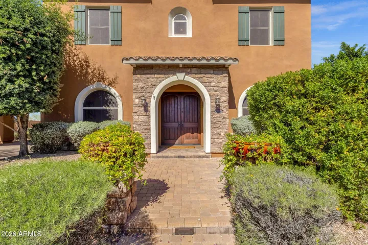 Stately entrance accessible from street and driveway, seemingly endless parking options.