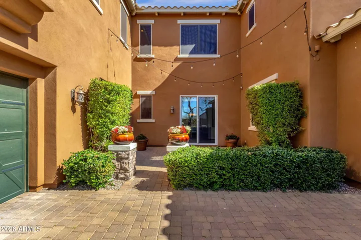 Private shade filled courtyard with direct access to kitchen and dining areas.