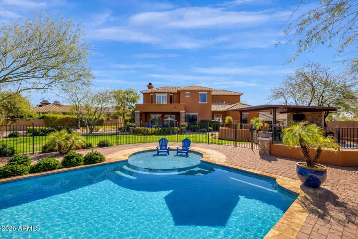 Swim pool, lap pool, resort style entry, water feature and spa.