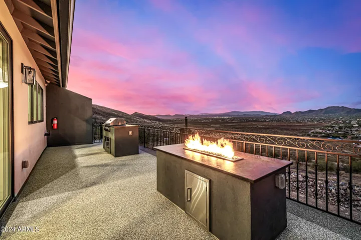 Main floor patio with propane fire pit.