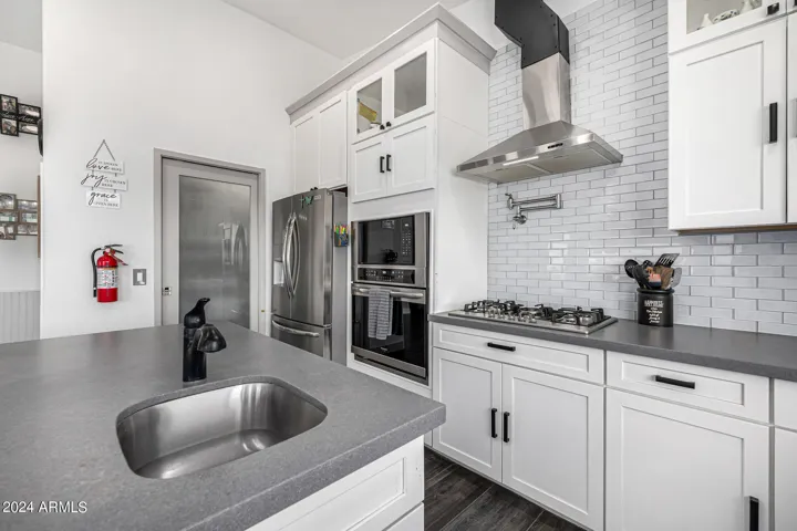 Prep sink on kitchen island.