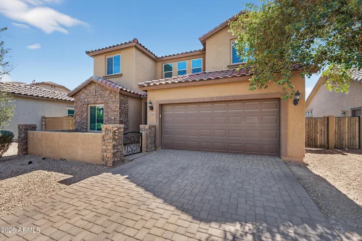 Gorgeous Home Features 4 Bedrooms, 3 Full Bathrooms, 9 Ft + Ceilings, Neutral Paint, Tile Flooring, Private Courtyard, and Paver Driveway.
