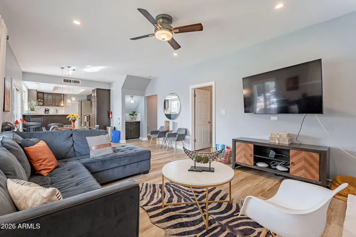 Great room flows to kitchen as well as out to 2nd flex space, laundry area and attached garage
