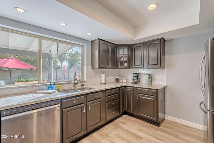 Granite countertops and stainless steel appliances make cooking a breeze