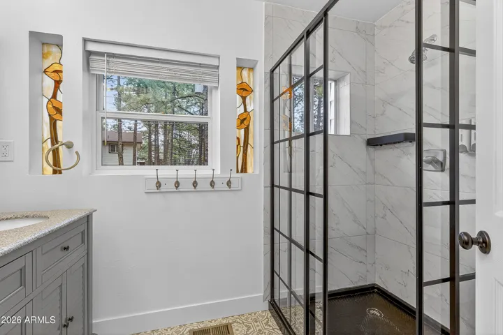Double vanity with walk-in shower