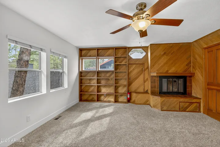 Private upstairs mother-in-law bedroom with ceiling fan