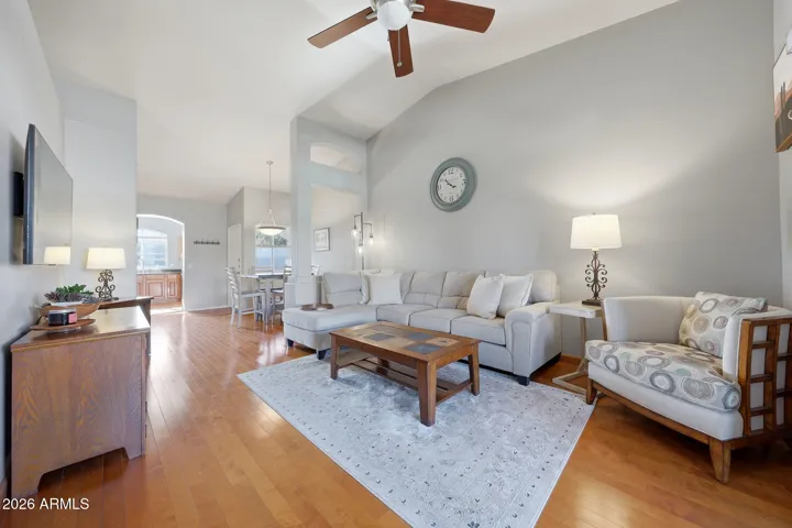 Bright living space with soaring vaulted ceilings