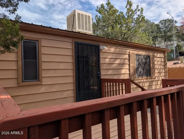 Very comfortable and large side deck (SW side) off the back door. Guesstimate 8 x 12 conservatively.