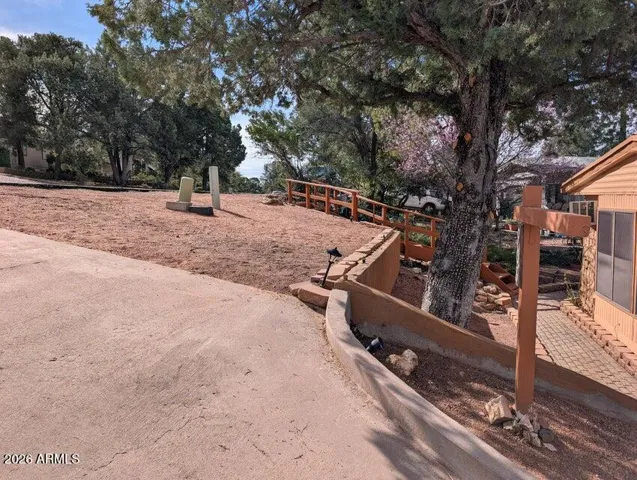 The drainage is very well managed with a beveled concrete edge curving away from the house.