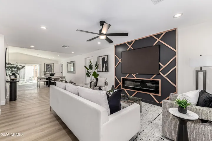 Custom designer wall with electric fireplace.