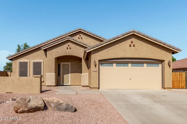 3 car tandem garage and RV gate with extended driveway