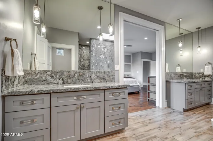Separate dual vanities
